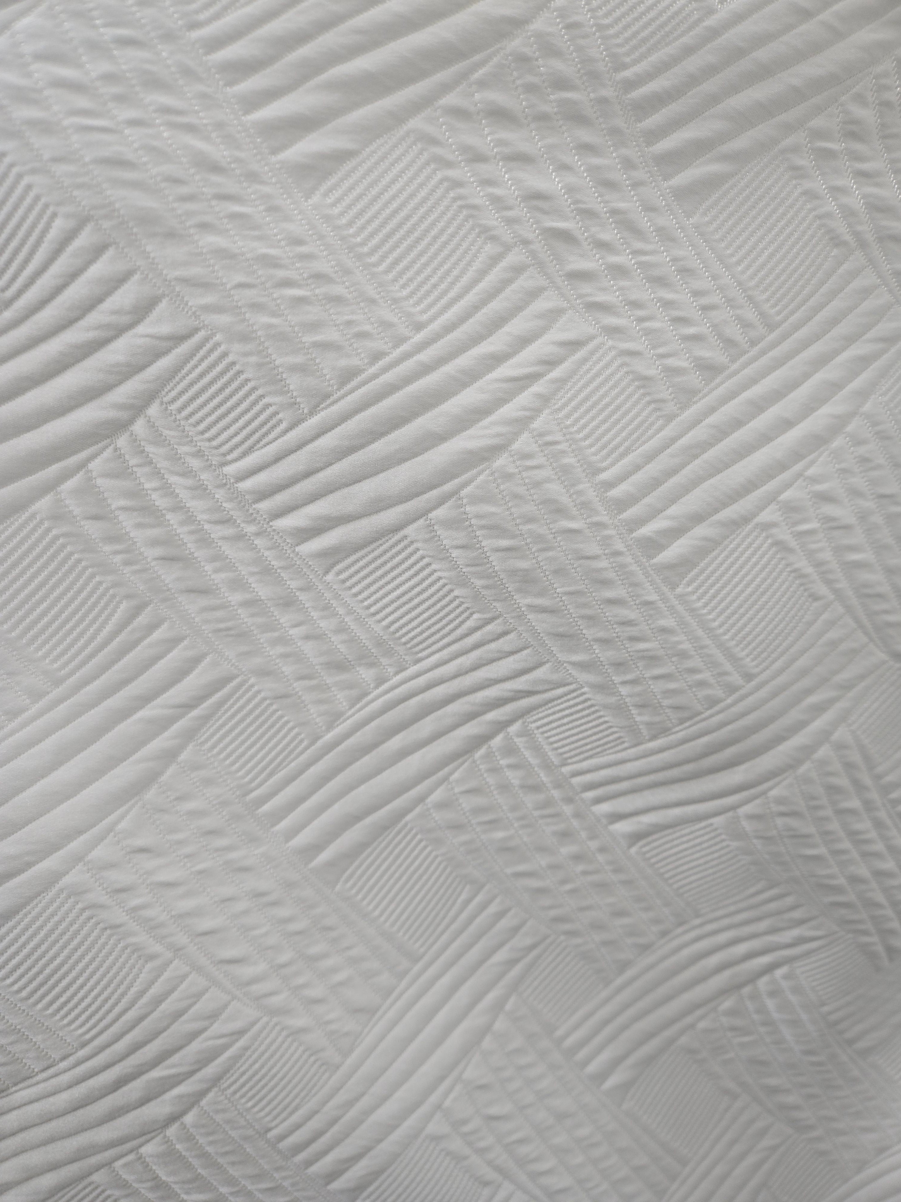 Trellis quilted white tablecloth, full table setting