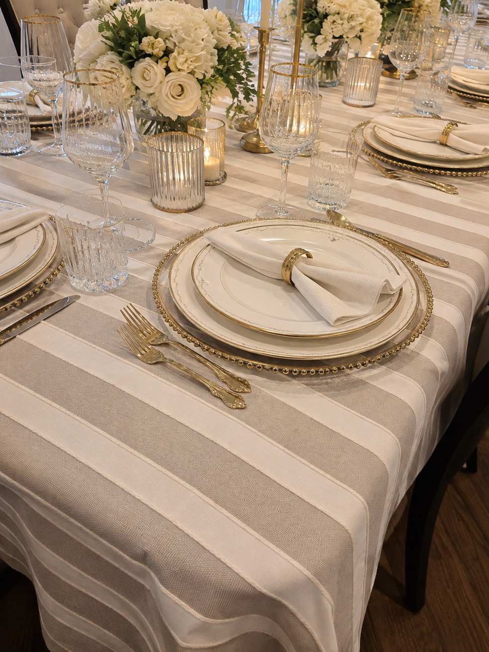 Savoie Tablecloth with taupe and cream stripes on a set dining table