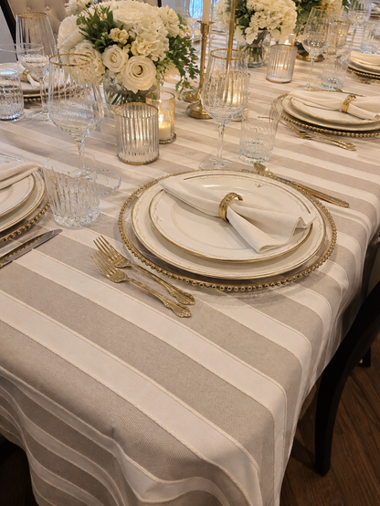 Savoie Tablecloth with taupe and cream stripes on a set dining table