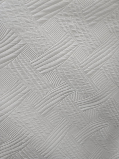 Trellis quilted white tablecloth, full table setting